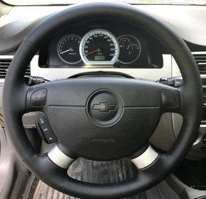 {{photo.Alt || photo.Description || 'Оплетка на руль из натуральной кожи Daewoo Gentra I-II (2005-2015)'}}