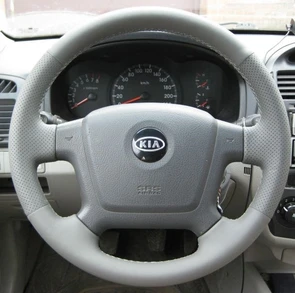 {{photo.Alt || photo.Description || 'Оплетка на руль из натуральной кожи Kia Cerato I 2004-2009'}}