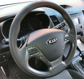 {{photo.Alt || photo.Description || 'Оплетка на руль из натуральной кожи Kia Cerato III 2013-2018'}}