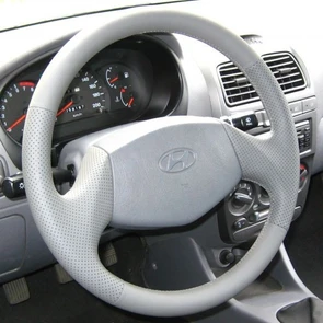{{photo.Alt || photo.Description || 'Оплетка на руль из натуральной кожи Hyundai Accent без подушки безопасности'}}