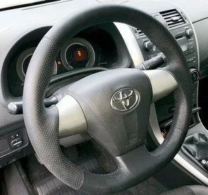 {{photo.Alt || photo.Description || 'Оплетка на руль из натуральной кожи Toyota Corolla X E140, E150 Рестайлинг (2010-2013)'}}