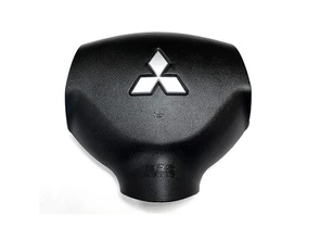 {{photo.Alt || photo.Description || 'Заглушка руля Mitsubishi Colt (2009-2010)'}}
