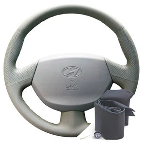 {{photo.Alt || photo.Description || 'Оплетка на руль Hyundai Accent МТ3, AТ5 с подушкой безопасности серая'}}
