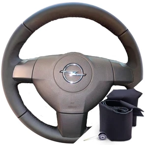 {{photo.Alt || photo.Description || 'Оплетка на руль Opel Vectra C 2005-2008 г.в. из экокожи Altona'}}