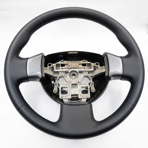 {{photo.Alt || photo.Description || 'Руль Nissan Almera Classic'}}