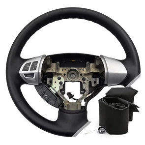 {{photo.Alt || photo.Description || 'Оплетка на руль Mitsubishi Pajero Sport 2 (2008-2015) для замены штатной кожи'}}