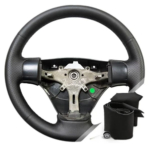 {{photo.Alt || photo.Description || 'Оплетка на руль Kia Rio 2 (2005-2009) для замены штатной кожи'}}