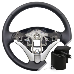 {{photo.Alt || photo.Description || 'Оплетка на руль Mitsubishi L200 (2006-2014) для замены штатной кожи'}}