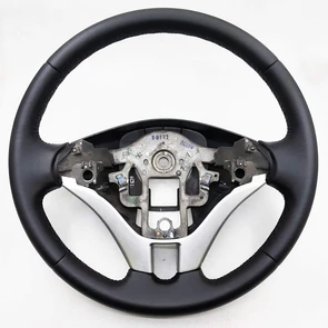 {{photo.Alt || photo.Description || 'Руль Mitsubishi L200 IV'}}