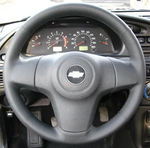 {{photo.Alt || photo.Description || 'Оплетка на руль из натуральной кожи Chevrolet Niva I рестайлинг 2009-н.в. (черная)'}}
