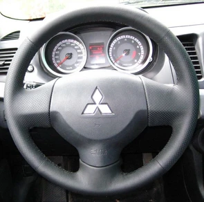 {{photo.Alt || photo.Description || 'Оплетка на руль Mitsubishi Lancer X (2007-2016) из натуральной кожи'}}