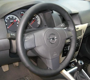 {{photo.Alt || photo.Description || 'Оплетка на руль из натуральной кожи Opel Astra G Classic 2006-2010 г.в. (черная)'}}