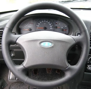 {{photo.Alt || photo.Description || 'Кожаная накладка на руль УАЗ-3163 Патриот 2005 - 2012'}}