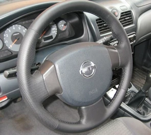 {{photo.Alt || photo.Description || 'Оплетка на руль из натуральной кожи Nissan Almera Classic I 2006-2013 г.в. (черная)'}}