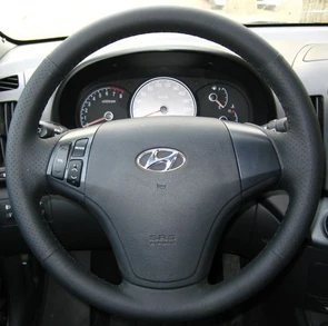 {{photo.Alt || photo.Description || 'Оплетка на руль из натуральной кожи Hyundai Elantra IV (HD) 2006-2010 г.в. (черная)'}}
