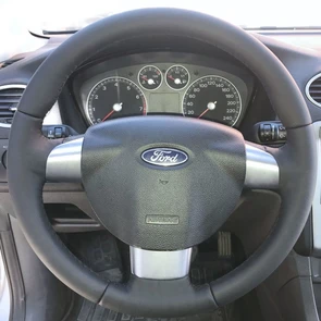 {{photo.Alt || photo.Description || 'Кожаная накладка на трехспицевый руль Ford Focus II'}}
